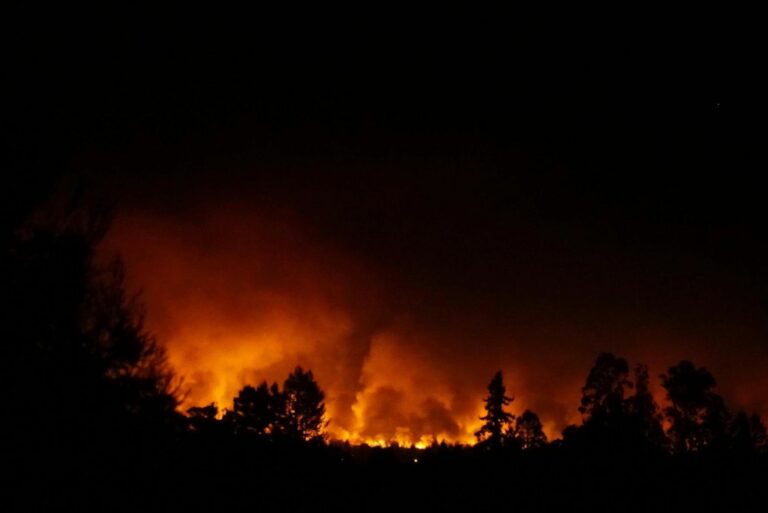 SLIDESHOW: Fire rages, ash falls