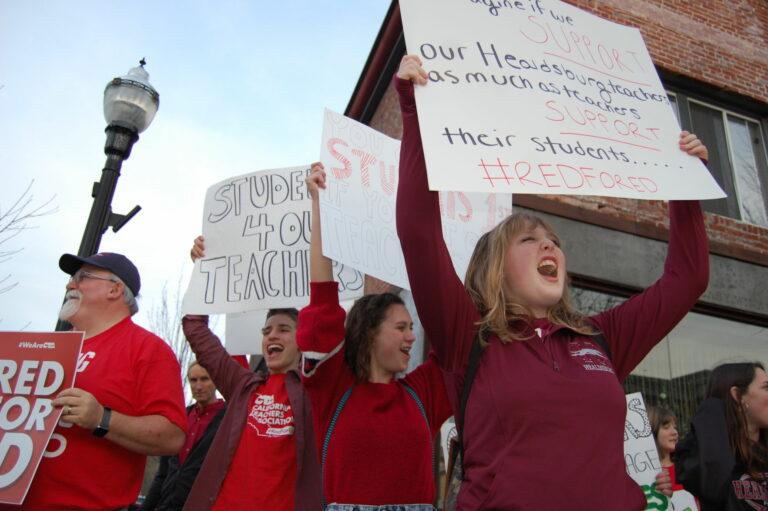 Teachers march for higher pay