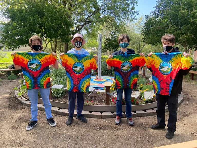 Peacetown volunteers and Analy students clean up the Peace Garden for Earth Day