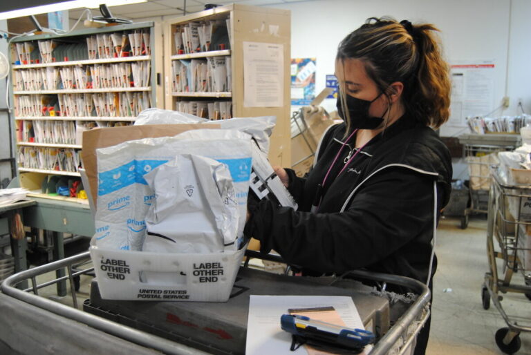 Through winding roads and rain, Forestville mail carrier delivers