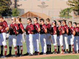 Team standing for anthem