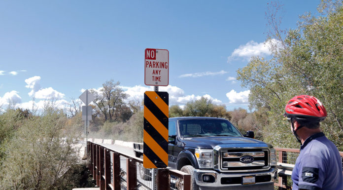 Bike and truck at bridge