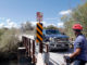 Bike and truck at bridge