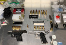 Arrest evidence of guns, ammo, drugs