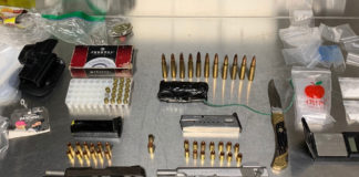 Arrest evidence of guns, ammo, drugs