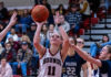 Claire Berry shooting a basket