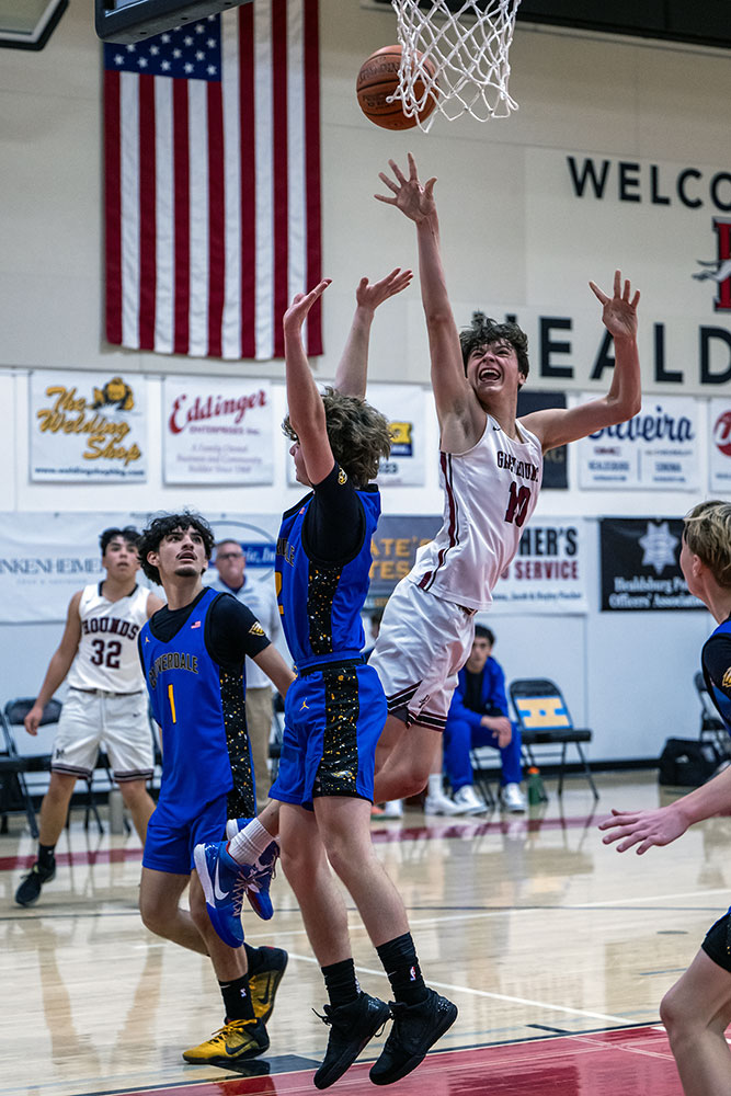 basketball action against Cloverdale