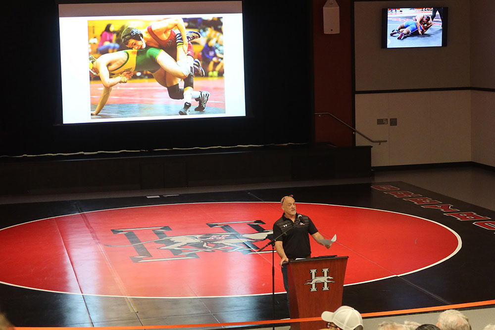 Wrestling coach Scott Weidemier in the new Drew Esquivel Gym dedication ceremony.