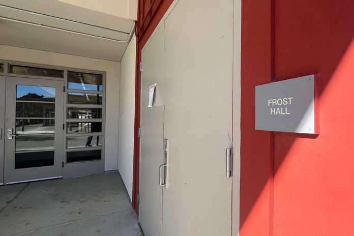 The Frost Hall sign on what is now the Drew Esquivel Gym