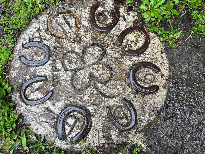 Rock inscribed with lucky symbols